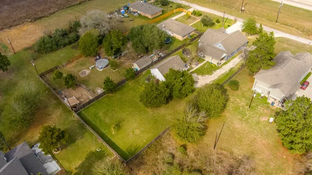 a room with furniture and wooden floor