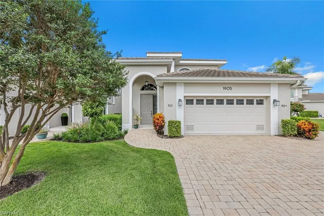 a front view of a house with patio