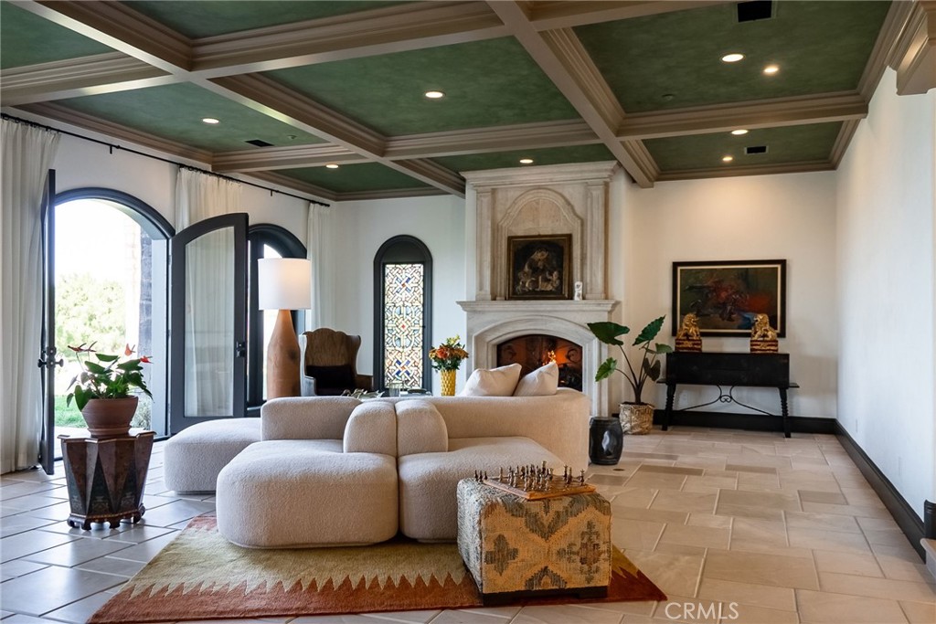 2019 Polo Court Riverside, CA 92506 - Photo 12 of 75 a living room with furniture and a potted plant