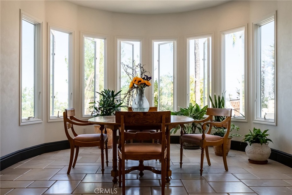 2019 Polo Court Riverside, CA 92506 - Photo 21 of 75 a view of a dining room with furniture and windows
