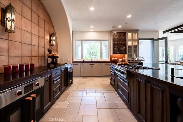a room with wooden floor and a tub