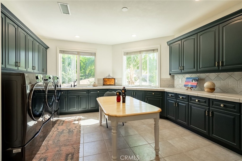 2019 Polo Court Riverside, CA 92506 - Photo 47 of 75 a kitchen with a sink and cabinets