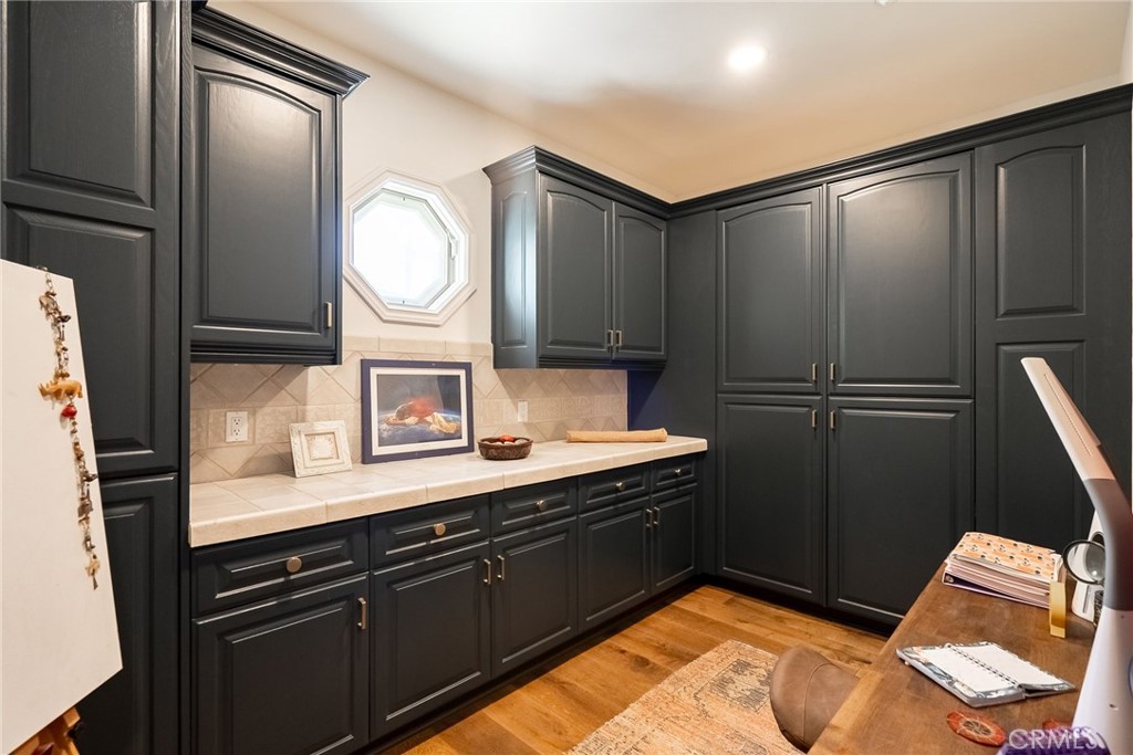 2019 Polo Court Riverside, CA 92506 - Photo 48 of 75 a kitchen with granite countertop a refrigerator and a sink