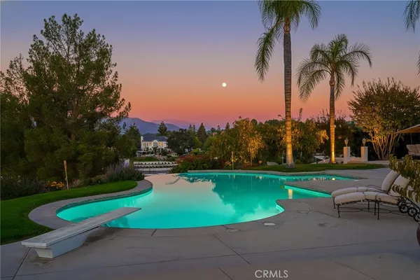 a close view of a utility room with dryer and washer