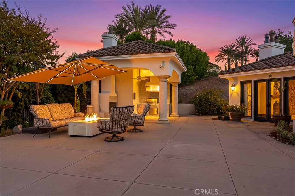 2019 Polo Court Riverside, CA 92506 - Photo 53 of 75 a view of a patio with swimming pool table and chairs