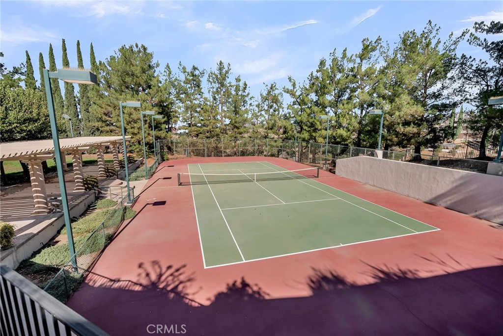 2019 Polo Court Riverside, CA 92506 - Photo 60 of 75 a view of an outdoor space and tennis court