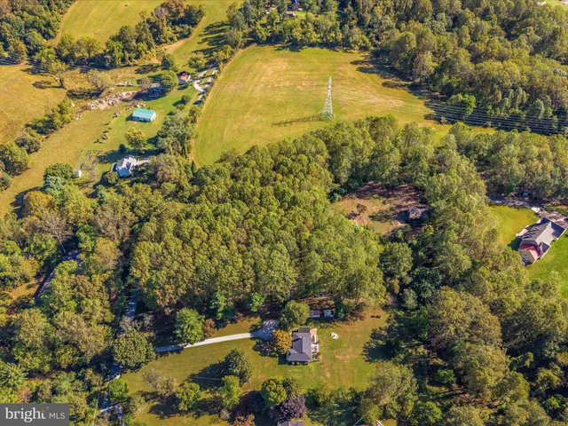 a view of a lake with a yard