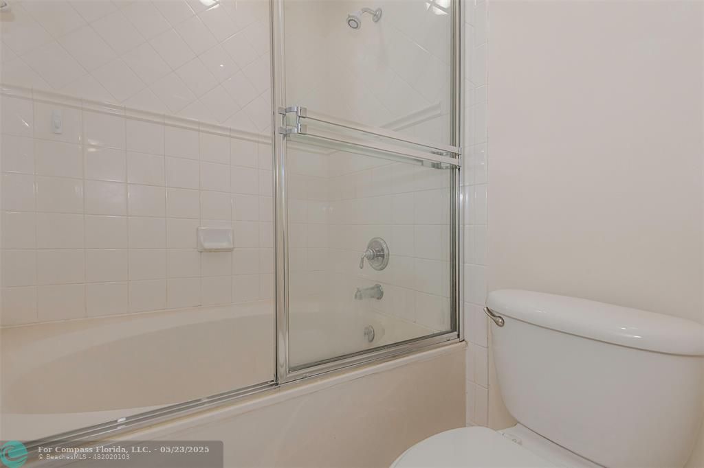 18798 Southwest 28th Street, Unit 18798 Miramar, FL 33029 - Photo 18 of 28 a bathroom with a shower and a toilet
