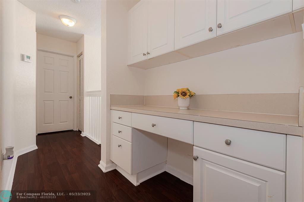 18798 Southwest 28th Street, Unit 18798 Miramar, FL 33029 - Photo 24 of 28 a kitchen with cabinets and window