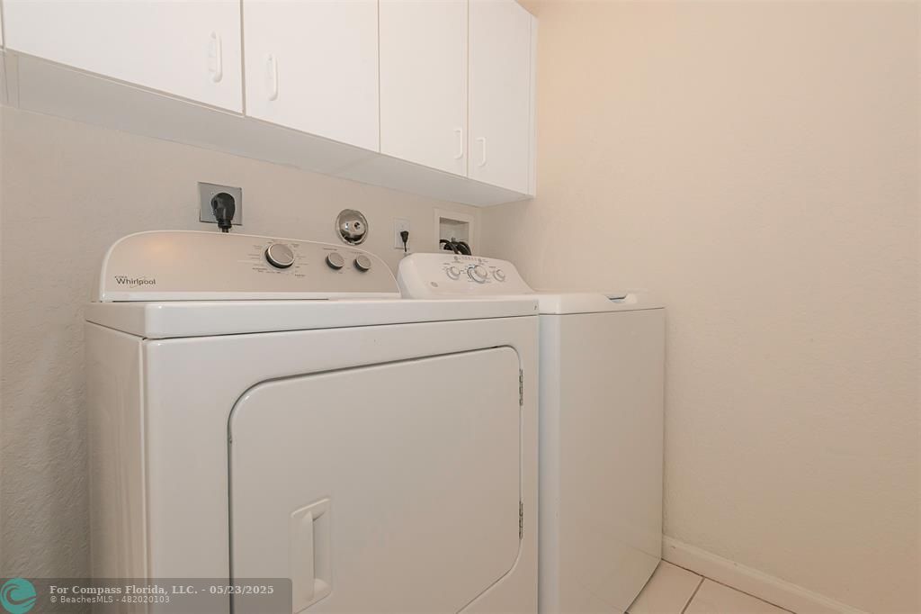 18798 Southwest 28th Street, Unit 18798 Miramar, FL 33029 - Photo 25 of 28 a utility room with dryer and washer