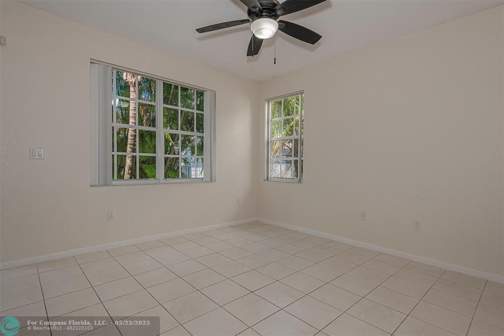 18798 Southwest 28th Street, Unit 18798 Miramar, FL 33029 - Photo 6 of 28 an empty room with windows