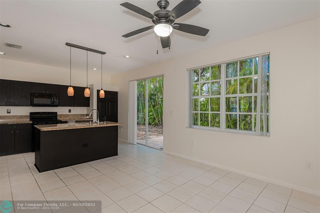 18798 Southwest 28th Street, Unit 18798 Miramar, FL 33029 - Photo 7 of 28 a view of kitchen with windows