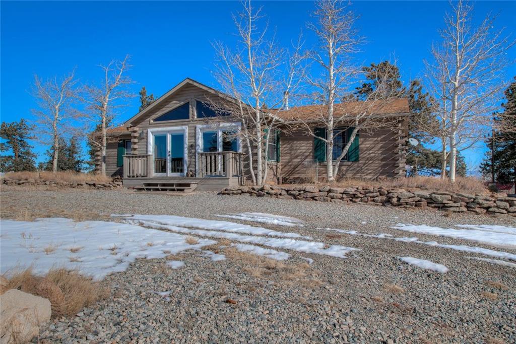 468 Wagon Wheel Road Hartsel, CO 80449 - Photo 2 of 30 a view of a house with a yard