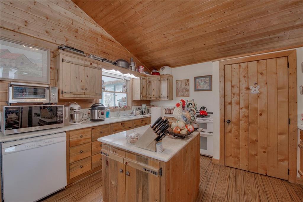 468 Wagon Wheel Road Hartsel, CO 80449 - Photo 13 of 30 a kitchen with a sink stove and cabinets