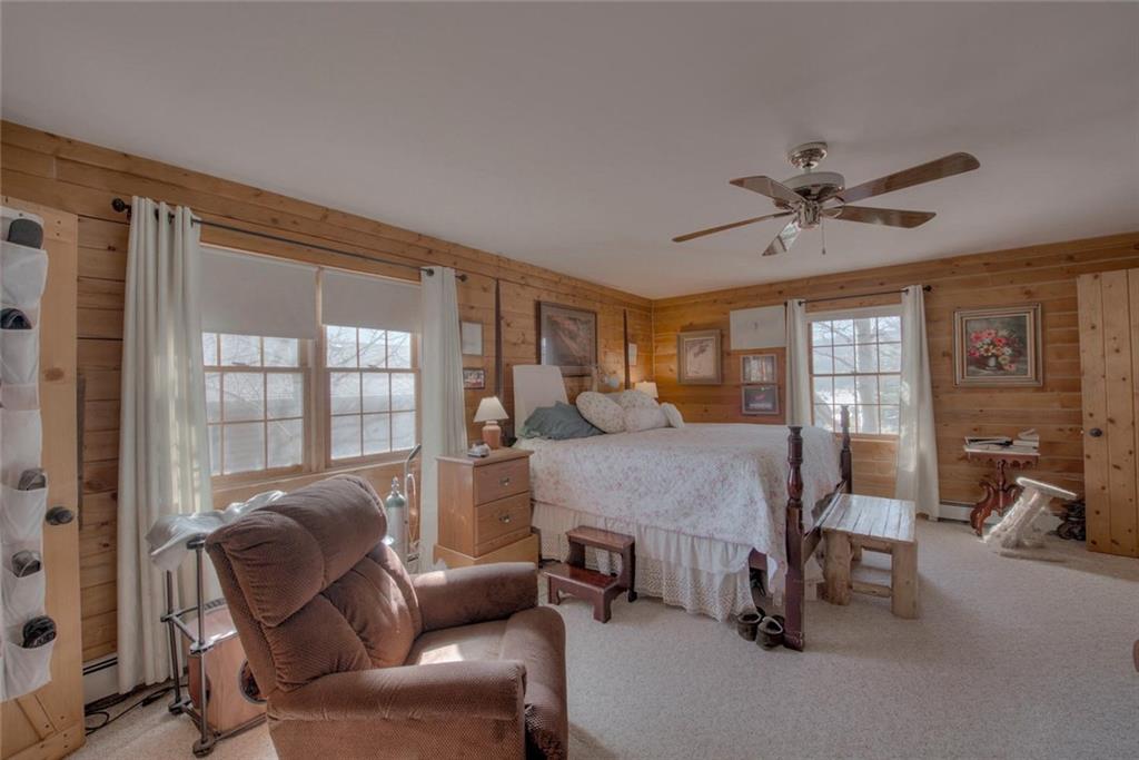 468 Wagon Wheel Road Hartsel, CO 80449 - Photo 17 of 30 a bed room with furniture and a window