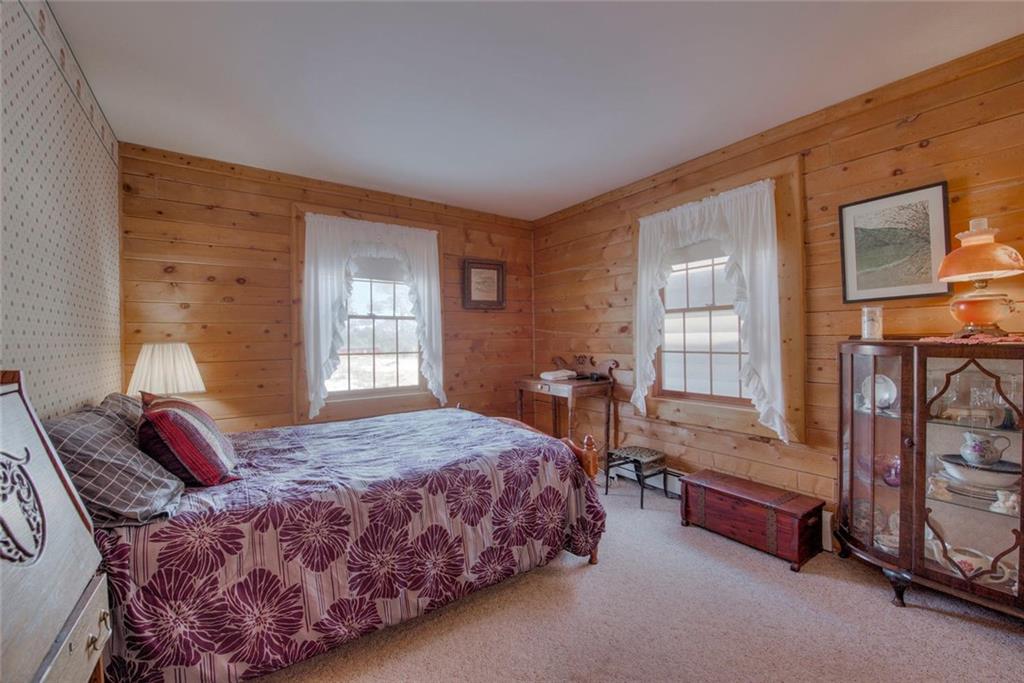 468 Wagon Wheel Road Hartsel, CO 80449 - Photo 19 of 30 a bedroom with bed and window