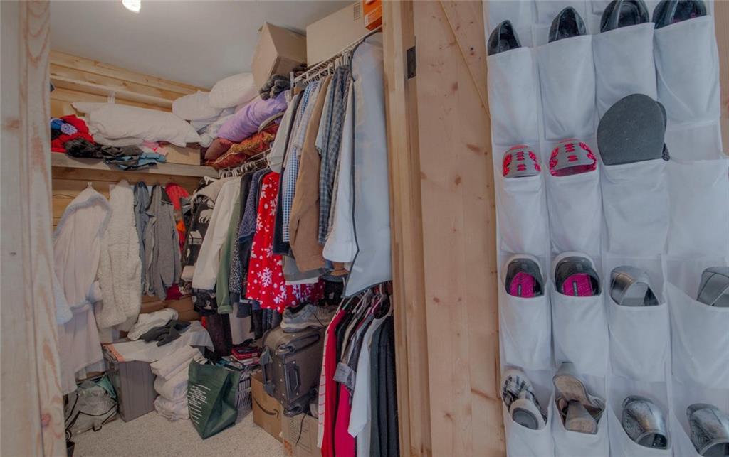 468 Wagon Wheel Road Hartsel, CO 80449 - Photo 25 of 30 a view of walk in closet with clothes