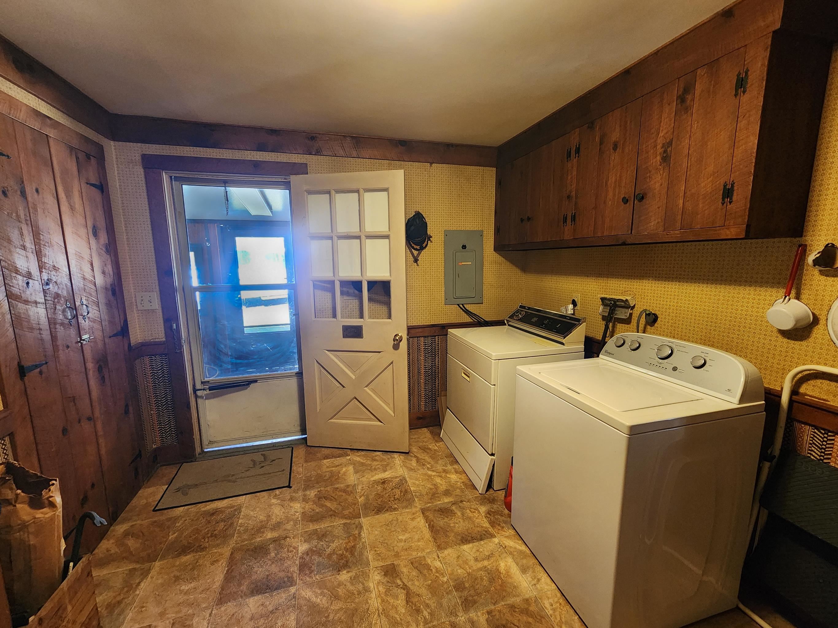 11611 Cowpasture River Road Williamsville, VA 24487 - Photo 12 of 29 a utility room with dryer and washer