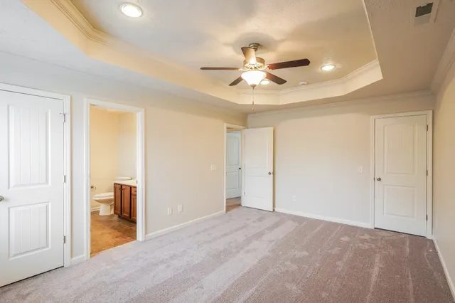 a view of a big room with wooden floor and closet in a room