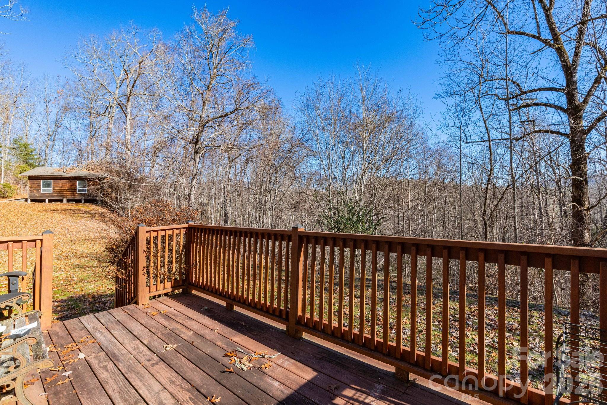 143 Hubert McCall Drive Balsam Grove, NC 28708 - Photo 2 of 21 a view of balcony with wooden floor