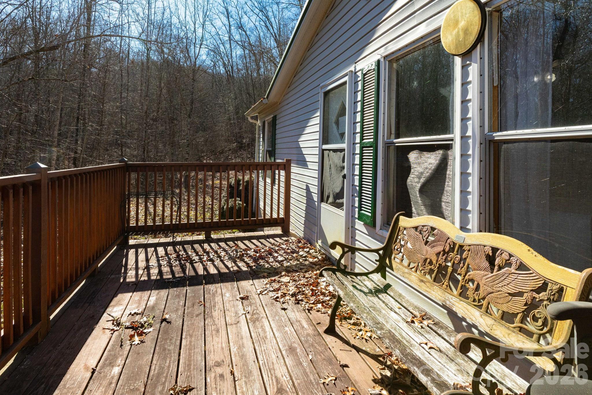 143 Hubert McCall Drive Balsam Grove, NC 28708 - Photo 3 of 21 a view of balcony with wooden floor