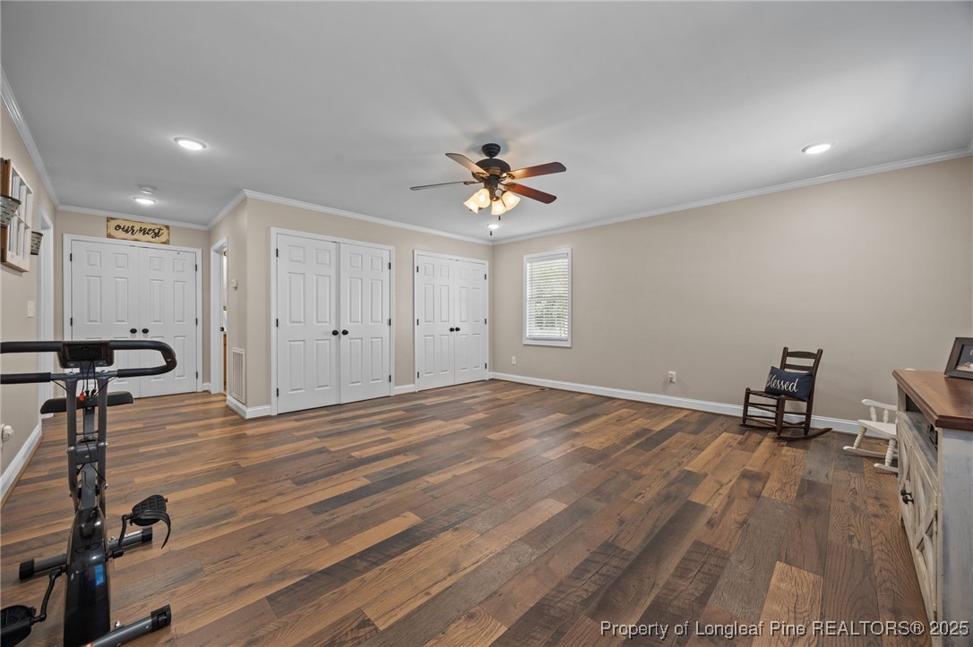 262 River Birch Run Coats, NC 27521 - Photo 12 of 49 a view of a livingroom with a hardwood floor and a ceiling fan
