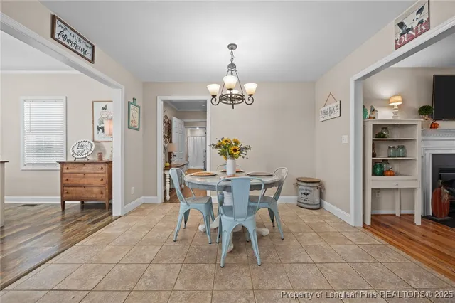 a kitchen with granite countertop a sink stainless steel appliances and cabinets