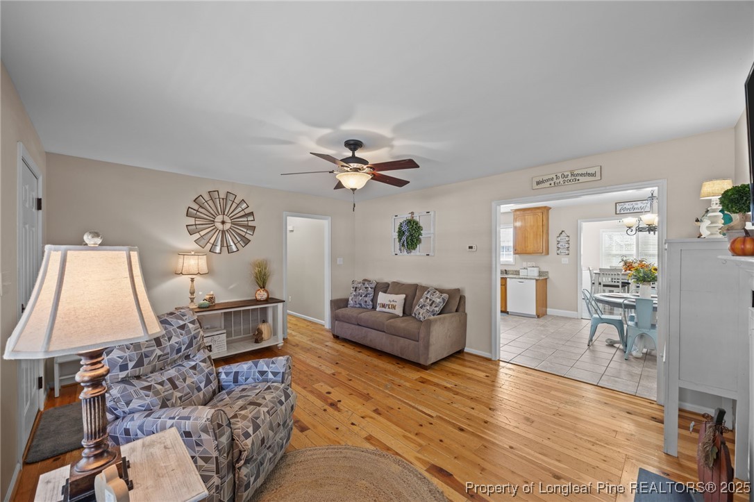262 River Birch Run Coats, NC 27521 - Photo 28 of 49 a living room with furniture and a table