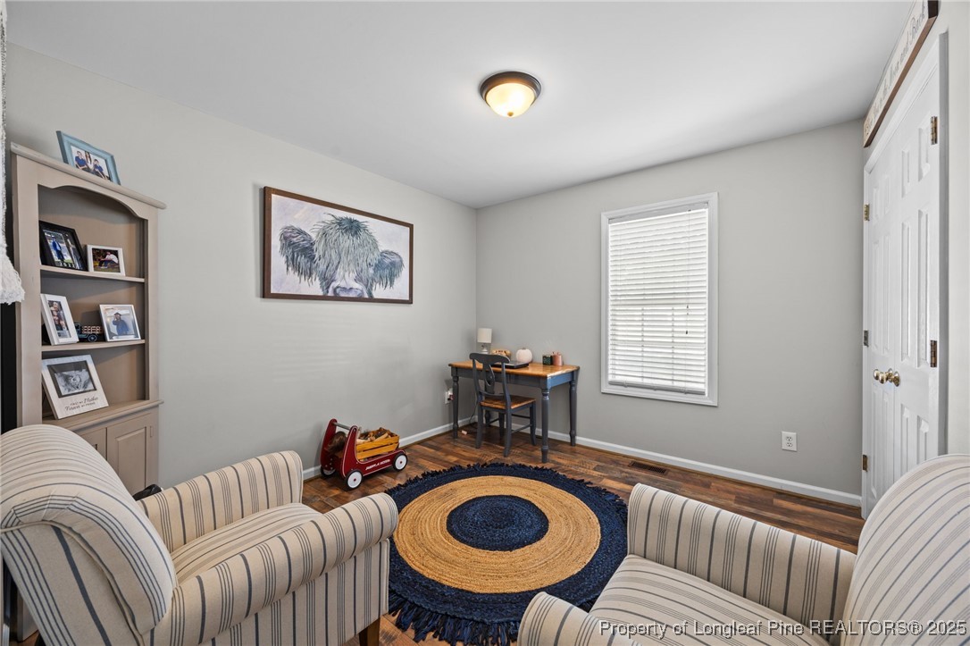 262 River Birch Run Coats, NC 27521 - Photo 29 of 49 a living room with furniture and a window