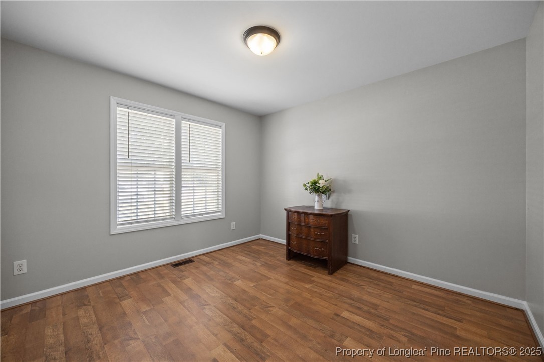 262 River Birch Run Coats, NC 27521 - Photo 31 of 49 an empty room with windows and closet