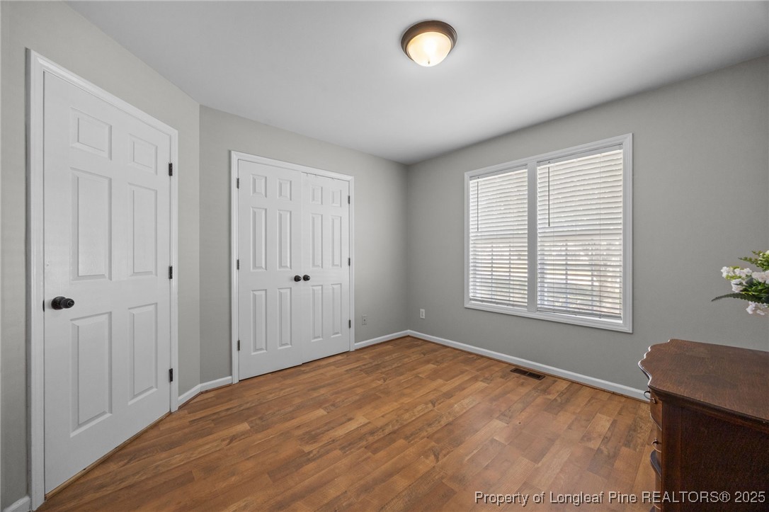 262 River Birch Run Coats, NC 27521 - Photo 33 of 49 a view of an empty room with a window