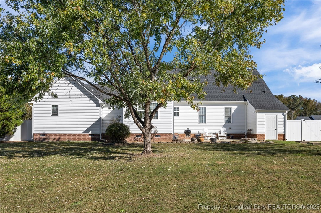 262 River Birch Run Coats, NC 27521 - Photo 41 of 49 a view of a house with backyard and trees