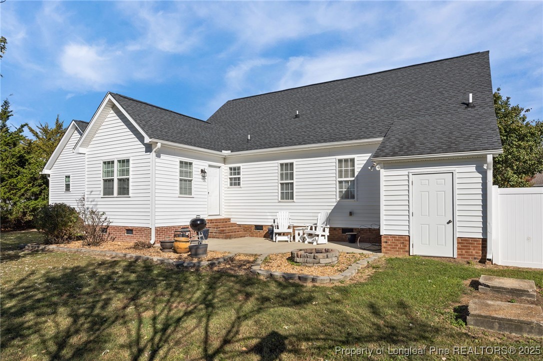 262 River Birch Run Coats, NC 27521 - Photo 42 of 49 a backyard of a house with table and chairs
