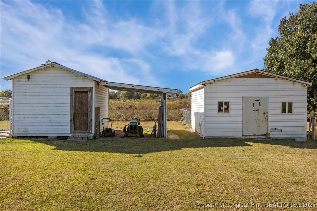 262 River Birch Run Coats, NC 27521 - Photo 45 of 49 a view of a house with a yard