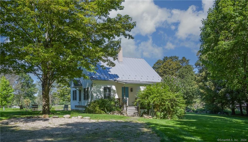 35 Jennings Road Kent, CT 06785 - Photo 12 of 20 a front view of a house with a yard