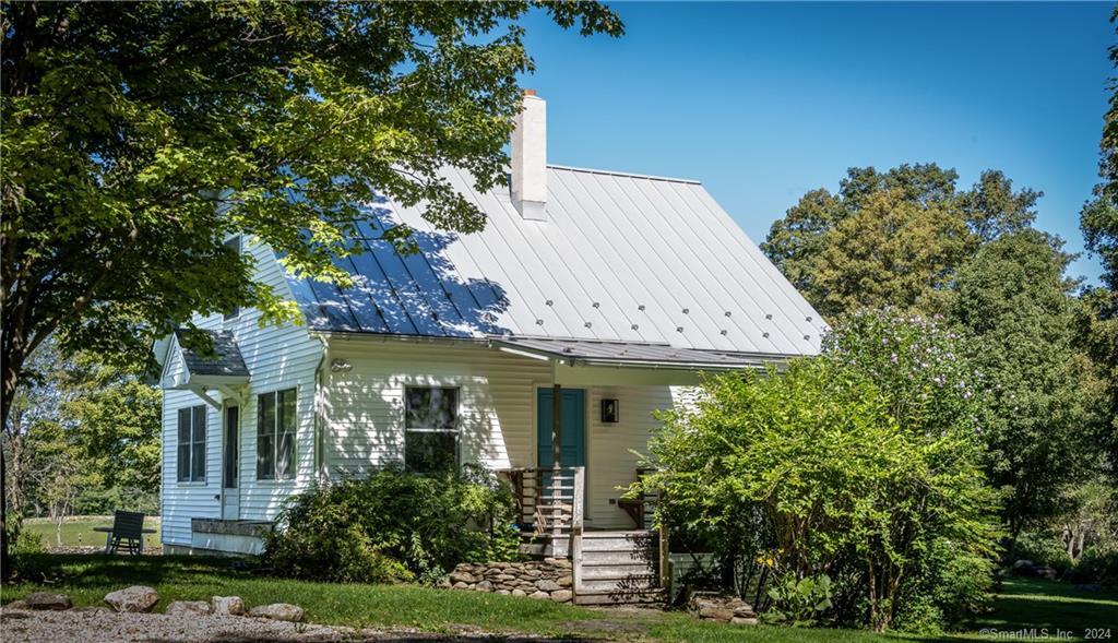 35 Jennings Road Kent, CT 06785 - Photo 13 of 20 a front view of a house with garden
