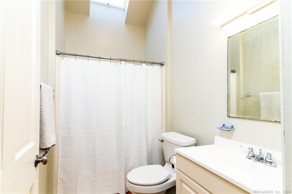 35 Jennings Road Kent, CT 06785 - Photo 2 of 20 a bathroom with a sink toilet and shower