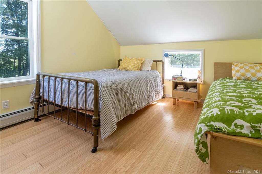 35 Jennings Road Kent, CT 06785 - Photo 9 of 20 a spacious bedroom with a bed and wooden floor