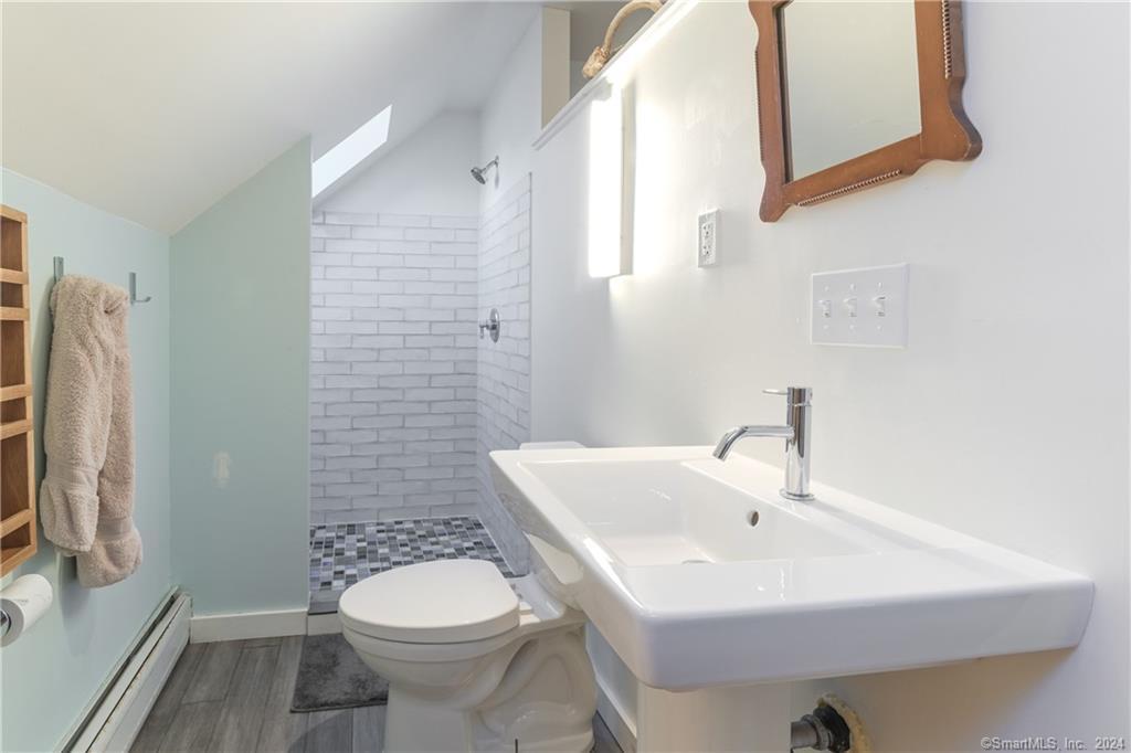 35 Jennings Road Kent, CT 06785 - Photo 10 of 20 a bathroom with a sink a toilet and mirror