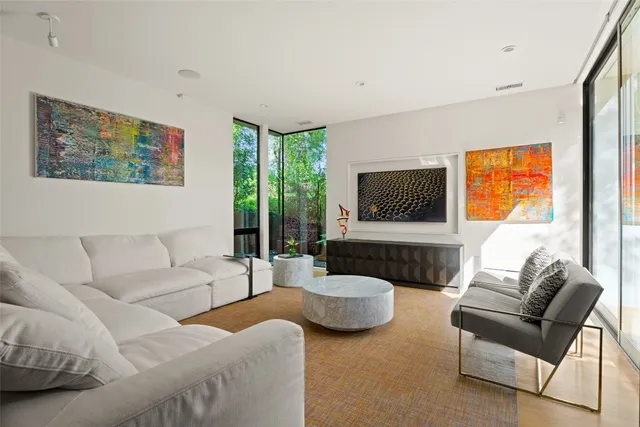 a living room with a couch and a window