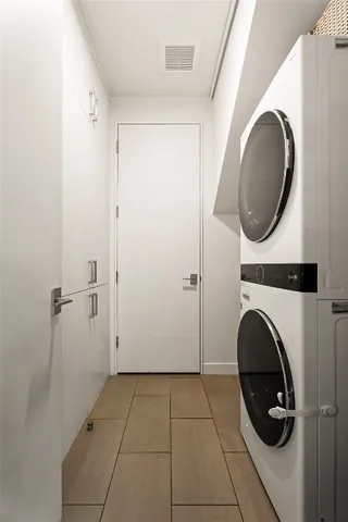 a view of a house with a yard and tree s