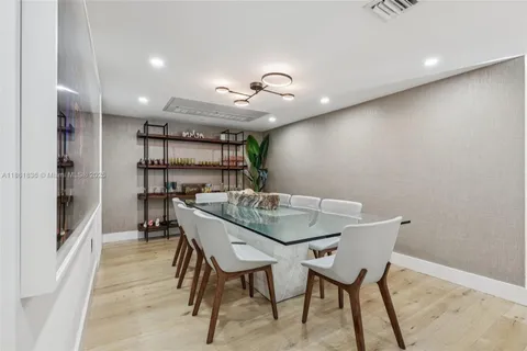 a bathroom with a shower and a sink