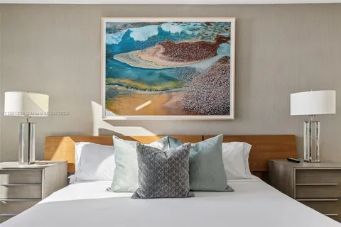 a bathroom with a toilet a sink and a shower