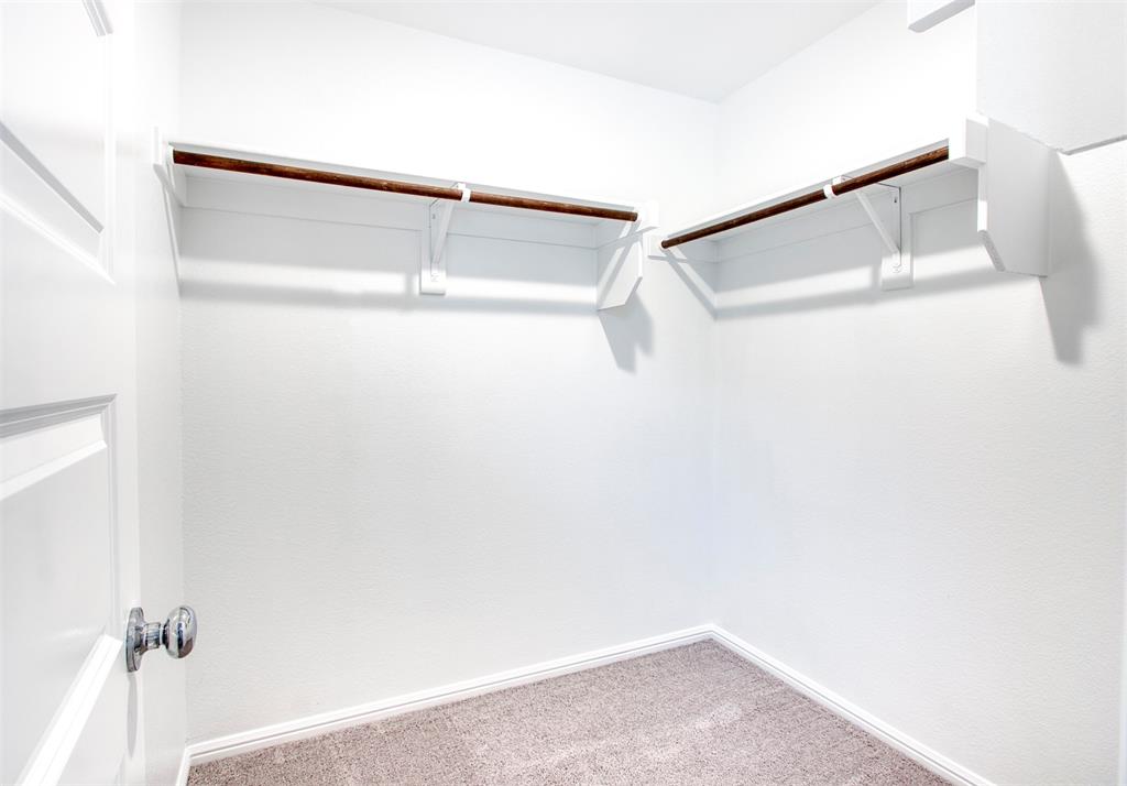 7108 Calshot Road Pilot Point, TX 76258 - Photo 19 of 28 Primary bedroom's walk-in closet.