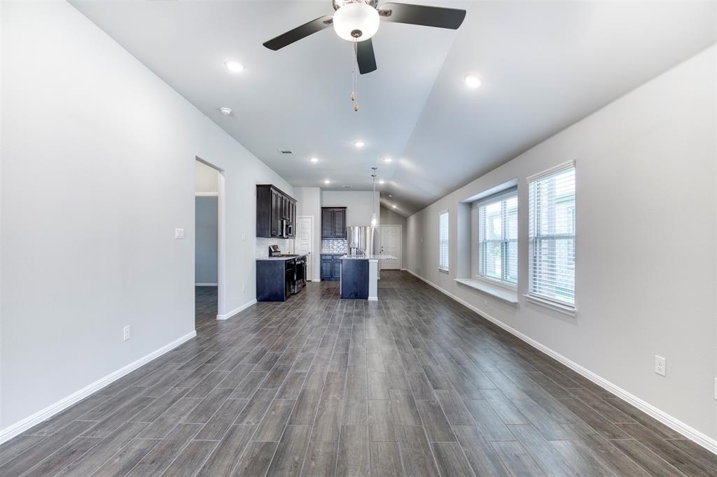 7108 Calshot Road Pilot Point, TX 76258 - Photo 7 of 28 Spacious living room with natural light.