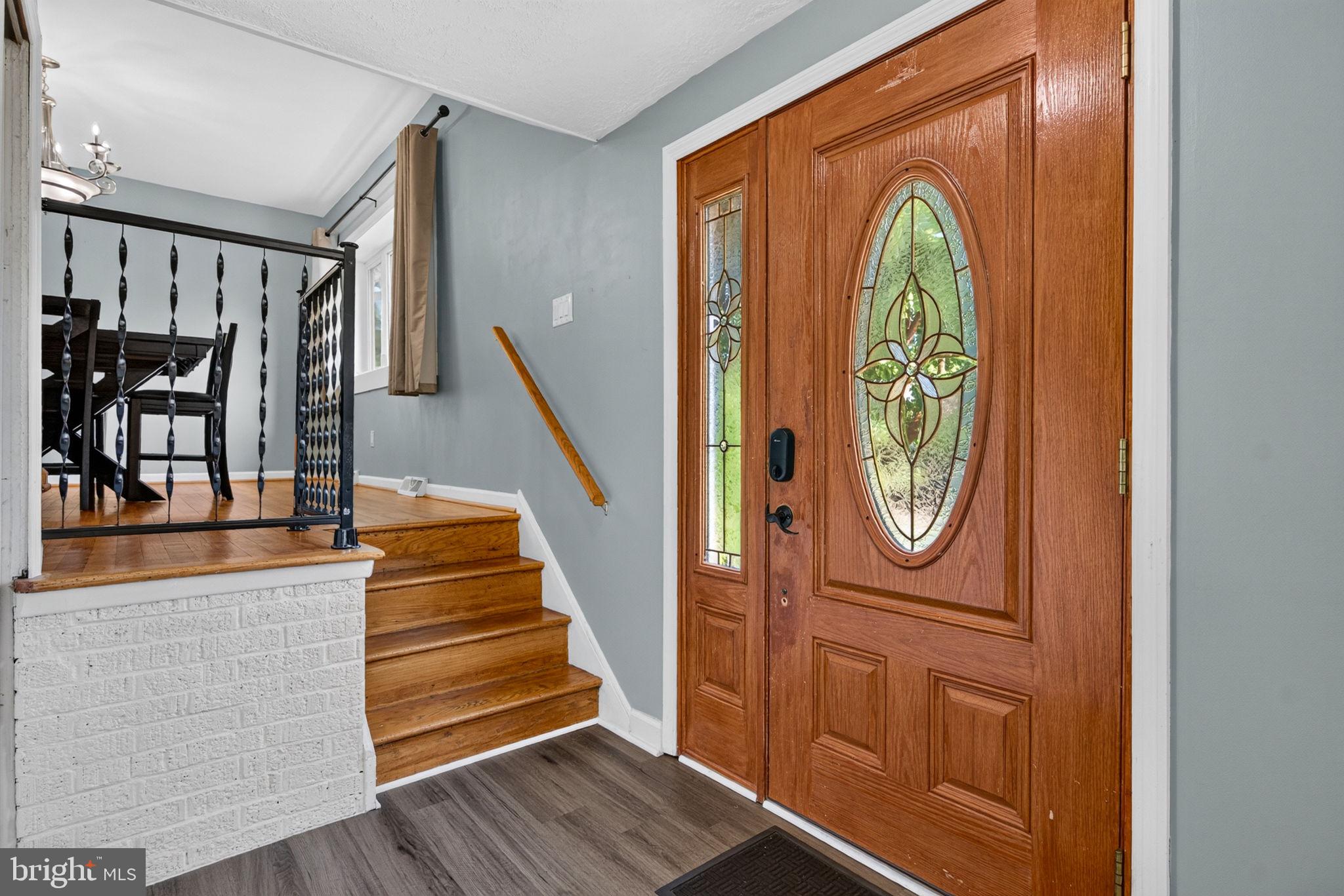 12 Woodbridge Road Gibbsboro, NJ 08026 - Photo 4 of 45 a view of entryway with wooden floor and door