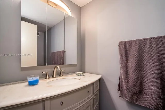 a view of swimming pool with outdoor seating and a patio