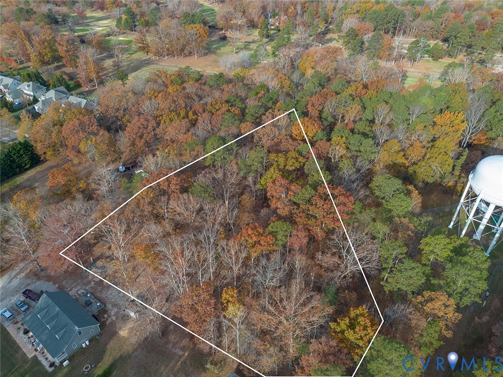 0 Creekmore Road Henrico, VA 23238 - Photo 4 of 7 a aerial view of a house with a yard