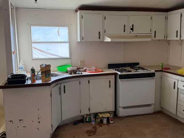 a view of a room that has a window