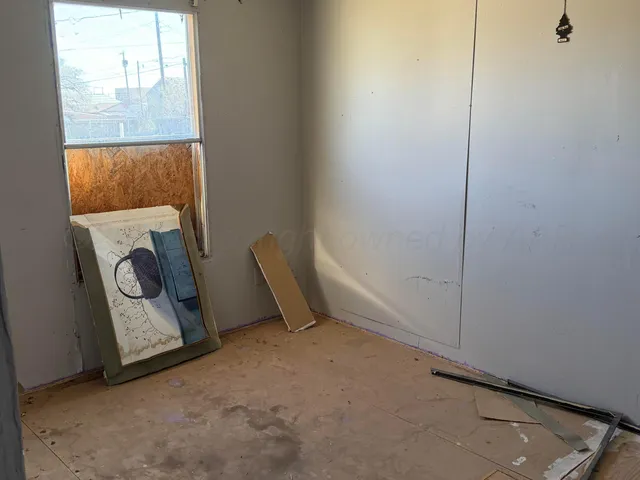 a view of a backyard with sitting area